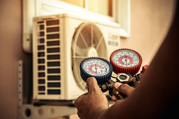 Professional Heat Pump Repair technician working in Painesville, OH